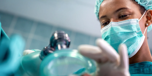 Anesthesiologist doctor anesthetizing a surgical patient in the hospital, ensuring safe anesthesia during surgery.